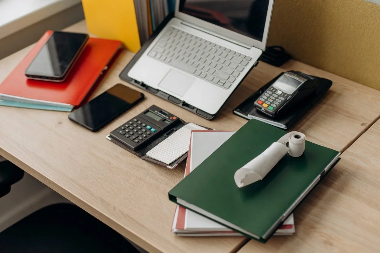 Corporate construction documents on a desk, representing a CCDC 9A progress payment statutory declaration