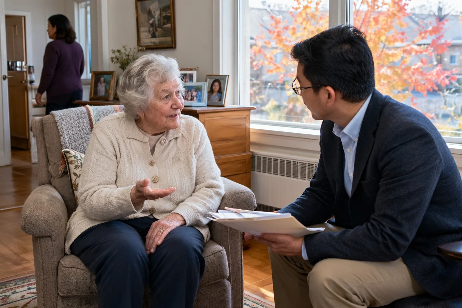 Notary listening as an elderly woman explains the document in her own words in her retirement residence suite